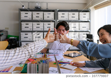 people working in creative workplaces 107779807