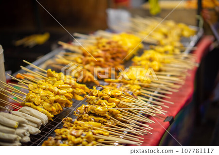 Street food next to the road, walking street" typically Street food next to the road, walking street" typically 107781117