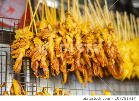 Street food next to the road, walking street" typically refers to a lively and popular culinary scene where vendors and food stalls set up along a street or pedestrian-only walkway, offering a wide Street food next to the road, walking street" typically refers to a lively and popular culinary scene where vendors and food stalls set up along a street or pedestrian-only walkway, offering a wide 107781417