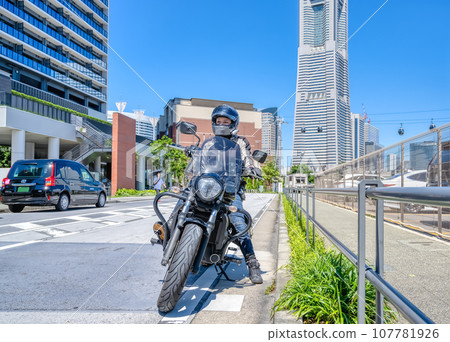 Female rider touring Yokohama 107781926