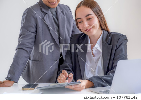 Business management group team meeting to plan strategies to increase business income in work office. Communication brainstorming graph analysis and discuss the new target success Business management group team meeting to plan strategies to increase business income in work office. Communication brainstorming graph analysis and discuss the new target success 107782142