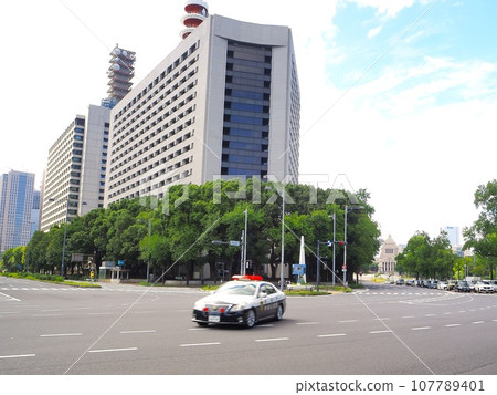 Tokyo Metropolitan Police Department Headquarters Building and Police Car September Tokyo Metropolitan Police Department Headquarters Building and Police Car September 107789401