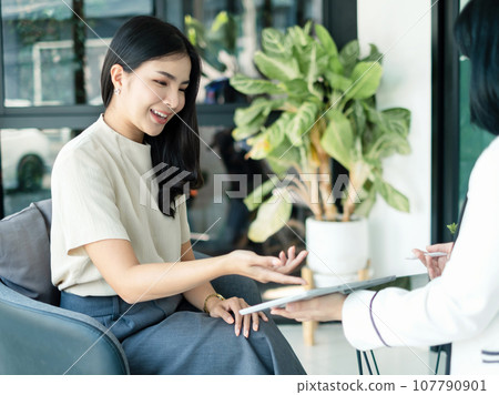 Female CEO and businesswoman meeting to discuss business plan displayed on screen laptop analyze and calculate planning strategies. business success process 107790901