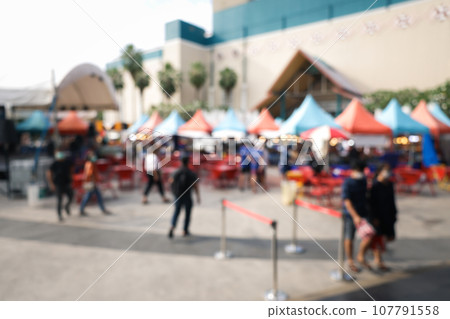 Blur image of flea market for background. 107791558