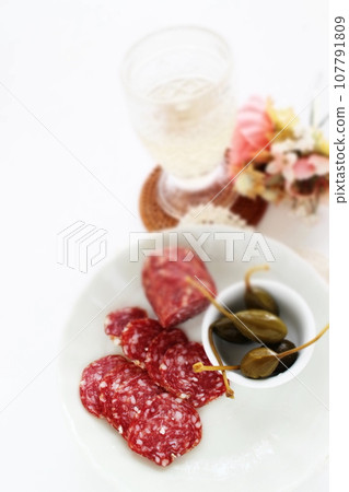 Salami and caper berry Salami and caper berry 107791809