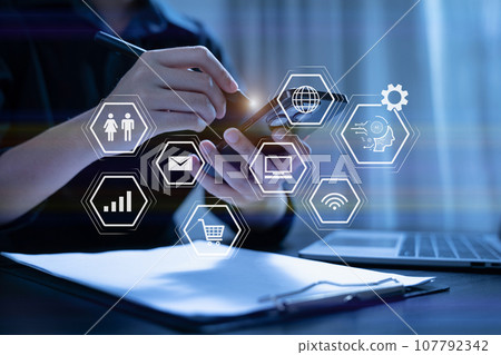 Digital transformation technology strategy, Person using laptop, tablet and smartphone with of things. transformation of ideas and the adoption. 107792342
