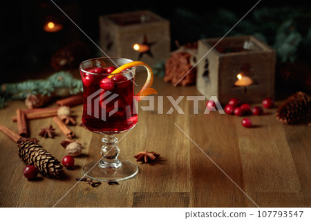 Christmas drink with spices and cranberries. 107793547