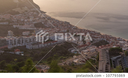 Aerial view of the coastline of the village of Sesimbra timelapse. Portugal Aerial view of the coastline of the village of Sesimbra timelapse. Portugal 107793869