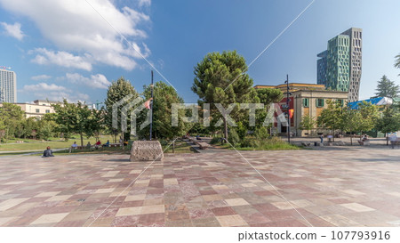Panorama showing the Skanderbeg memorial and Ethem Bey mosque on the main square in Tirana timelapse, Albania Panorama showing the Skanderbeg memorial and Ethem Bey mosque on the main square in Tirana timelapse, Albania 107793916