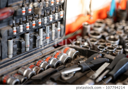 Box of screwdriver bit pieces and drive socket wrench set Box of screwdriver bit pieces and drive socket wrench set 107794214