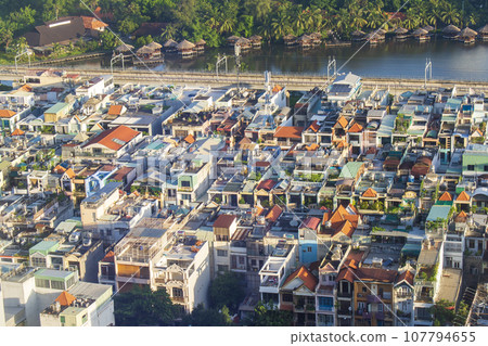 Ho Chi Minh cityscape lined with colorful houses 107794655