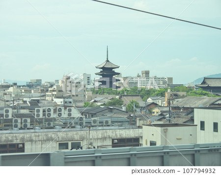 Toji Temple from the Shinkansen window in August Toji Temple from the Shinkansen window in August 107794932