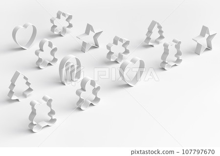 Set of metal cookie cutters for homemade Christmas biscuit on a white Set of metal cookie cutters for homemade Christmas biscuit on a white 107797670