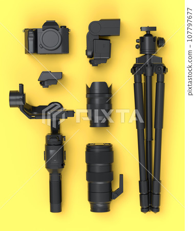 Top view of monochrome designer workspace and photography gear on yellow Top view of monochrome designer workspace and photography gear on yellow 107797677