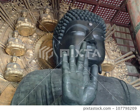 Todai-ji Temple, officially known as the temple of the Great Buddha of Nara, located in Nara City, Nara Prefecture, is the temple of Konkomyo Shitenno Gokoku-no-ji. 107798209