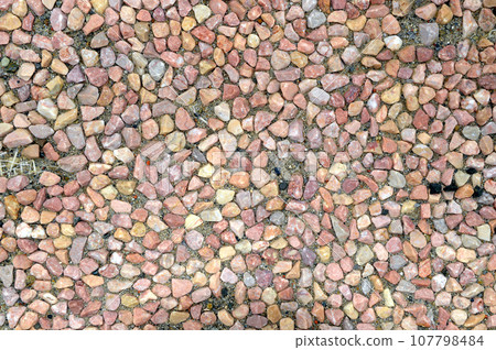 Background made of beige,brown and dark brown small stones Background made of beige,brown and dark brown small stones 107798484