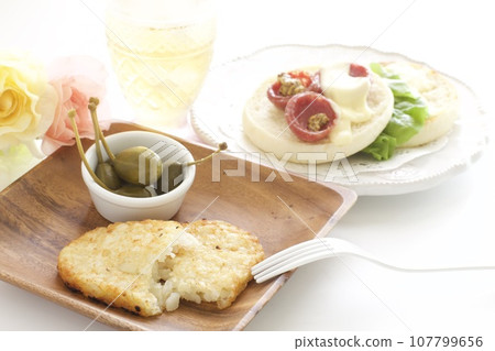 hash browns and caper berries hash browns and caper berries 107799656