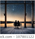 Silhouettes of a man and woman sitting and relaxing on a bench under the moonlight 107801122