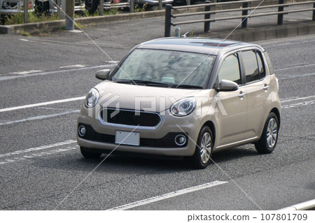Compact car road driving 107801709