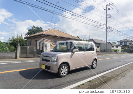 Light passenger car road driving Light passenger car road driving 107801810