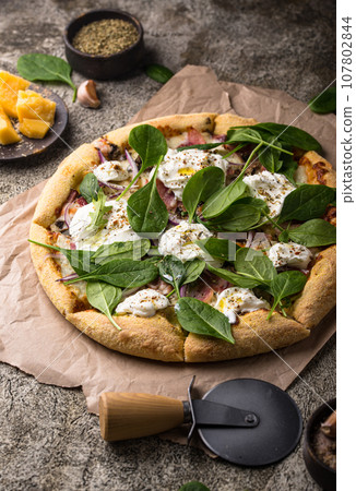 Italian pizza with soft cheese mozzarella Italian pizza with soft cheese mozzarella 107802844
