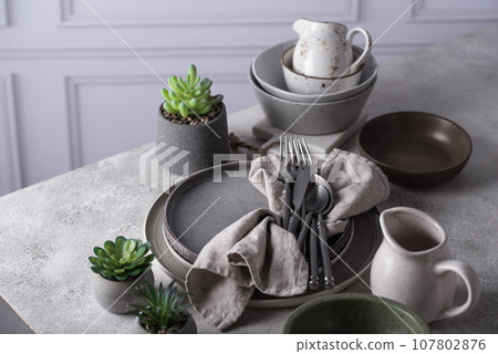 Craft ceramic plates, bowls and cups Craft ceramic plates, bowls and cups 107802876