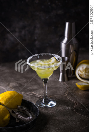 Lemon citrus Margarita or Martini cocktail 107802904