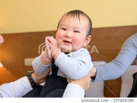 Baby being held by father, Rest, Infant, Ikumen, Childcare leave, 0 year old infant Baby being held by father, Rest, Infant, Ikumen, Childcare leave, 0 year old infant 107805586
