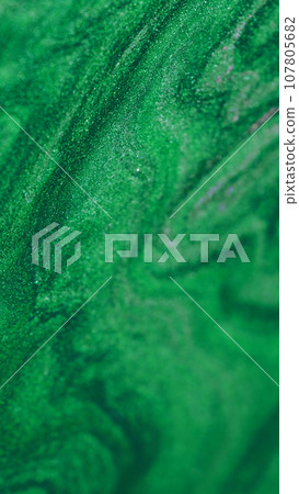 Liquid paint background green glitter 107805682