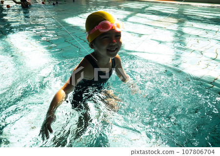 5 year old in the pool 5 year old in the pool 107806704
