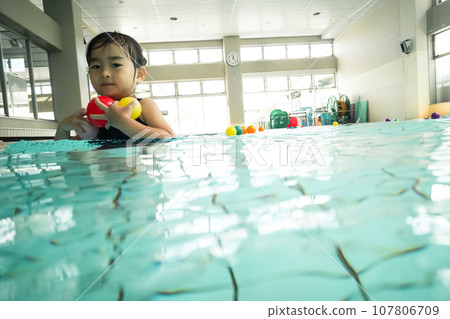 4 year old in the pool 107806709