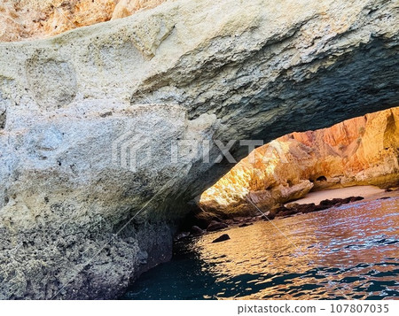 Beautiful view of Benagil Cave in Carvoeiro Algarve Portugal Beautiful view of Benagil Cave in Carvoeiro Algarve Portugal 107807035