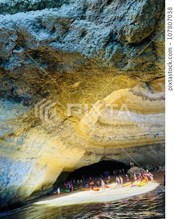 Beautiful view of Benagil Cave in Carvoeiro Algarve Portugal Beautiful view of Benagil Cave in Carvoeiro Algarve Portugal 107807038