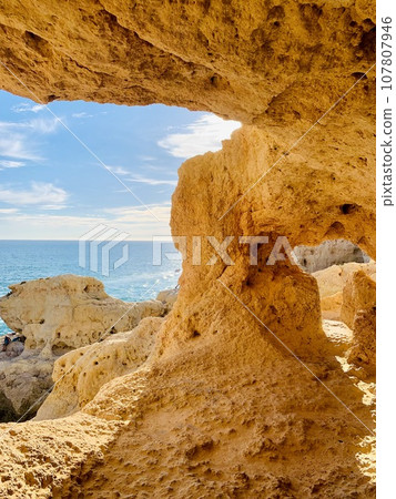 Reef formation from sandstone on the coast.Algar Seco, Carvoeiro. 107807946