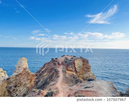 Reef formation from sandstone on the coast.Algar Seco, Carvoeiro. 107807967