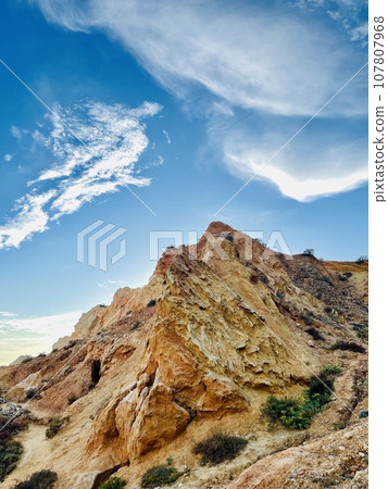 Reef formation from sandstone on the coast.Algar Seco, Carvoeiro. 107807968