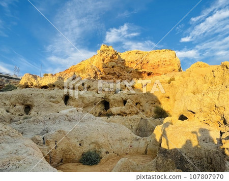 Reef formation from sandstone on the coast.Algar Seco, Carvoeiro. 107807970