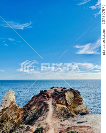 Reef formation from sandstone on the coast.Algar Seco, Carvoeiro. 107807973