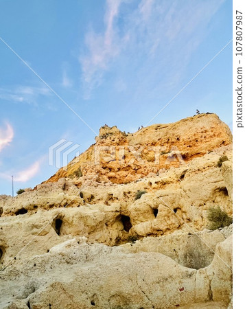 Reef formation from sandstone on the coast.Algar Seco, Carvoeiro. Reef formation from sandstone on the coast.Algar Seco, Carvoeiro. 107807987