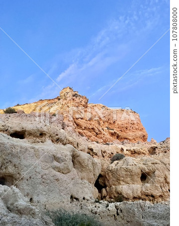 Reef formation from sandstone on the coast.Algar Seco, Carvoeiro. Reef formation from sandstone on the coast.Algar Seco, Carvoeiro. 107808000