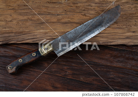 Retro vintage hunting knife Retro vintage hunting knife 107808742