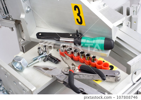 screwdriver, screw, nuts - industrial equipment support screwdriver, screw, nuts - industrial equipment support 107808746