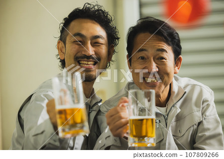 Workers toasting 107809266