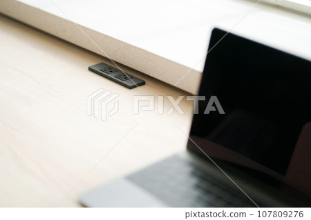 Laptop on table Laptop on table 107809276