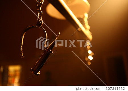 Criminal hands with Police Handcuffs Criminal hands with Police Handcuffs 107811632