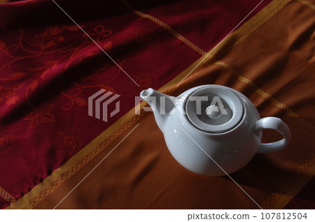 Cup on the table Cup on the table 107812504