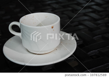 Cup on the table 107812589