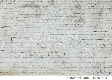 old dirty white painted brick wall, full-frame background and texture 107813910