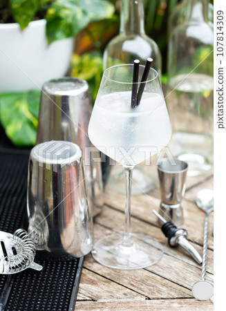 Cocktail glass with alcohol drink on table Cocktail glass with alcohol drink on table 107814309