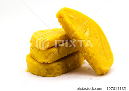 Gram flour sweets on white background with selective focus 107815185